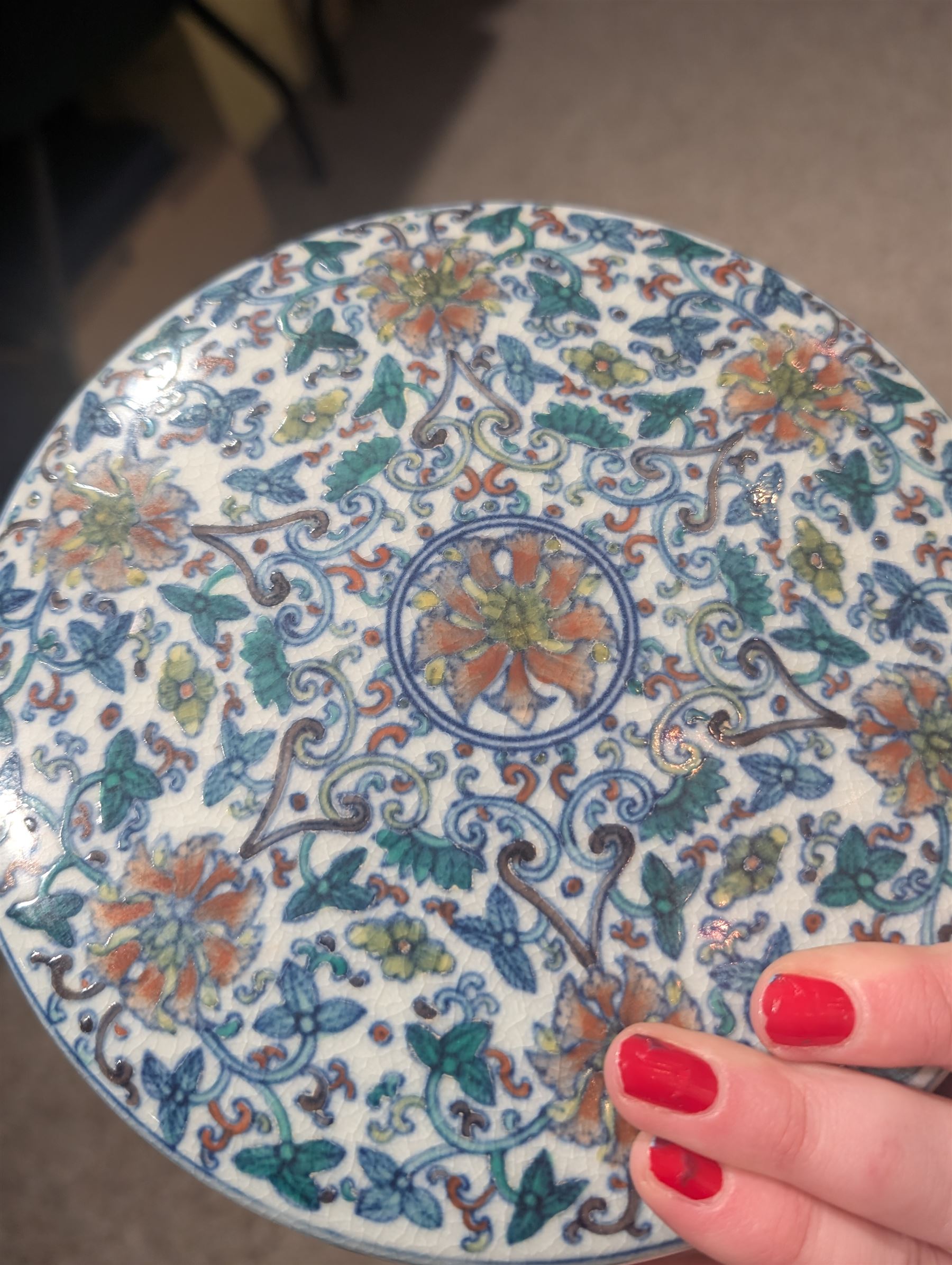 20th century Chinese Doucai box, of circular form, decorated in polychrome enamels with flowers and foliage, with character marks beneath, D18cm, H9cm