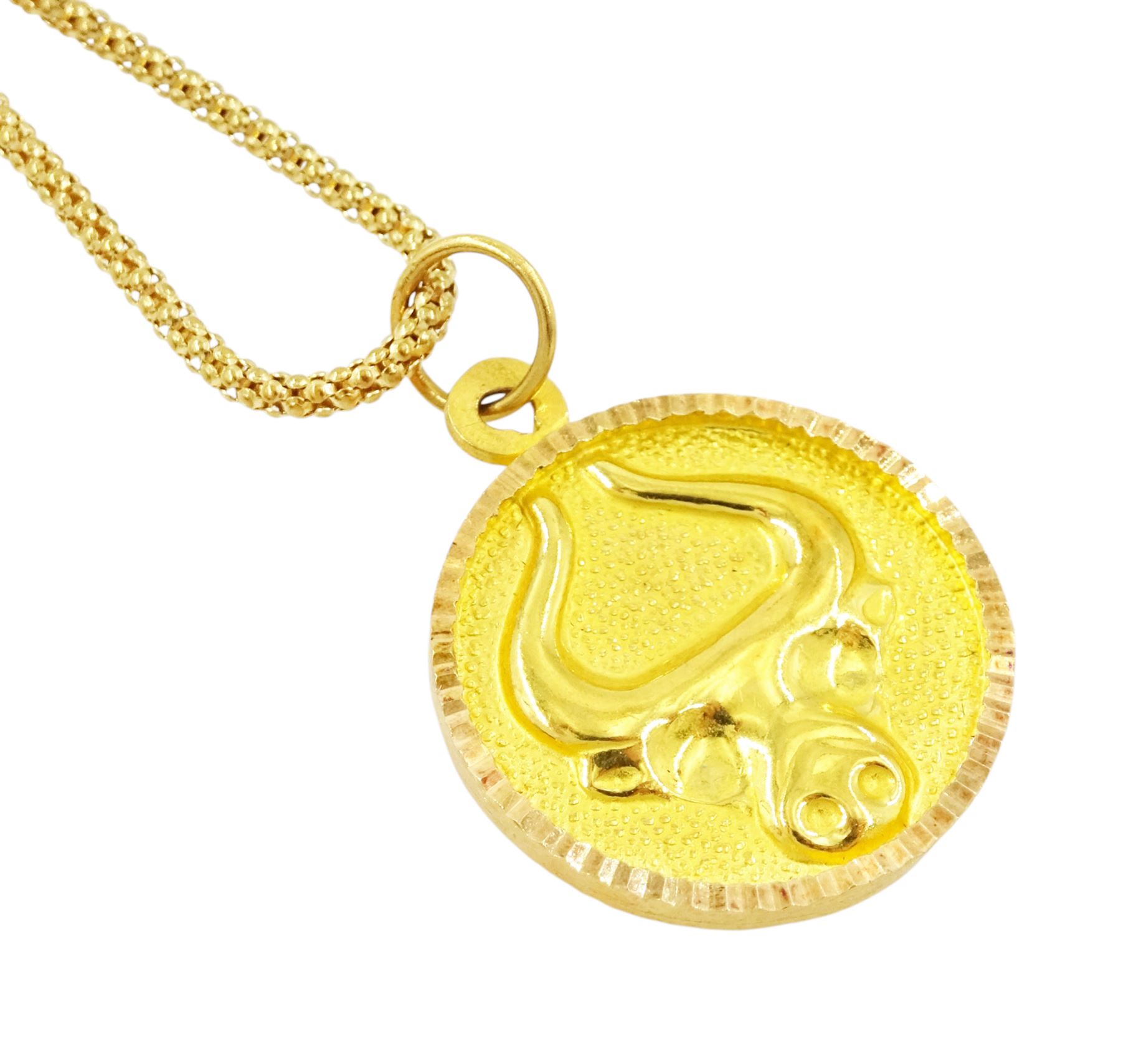 21ct gold Taurus pendant, stamped 875, on 18ct gold popcorn link chain necklace, stamped 750