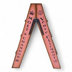 Three-piece champagne advertising display set, comprising pine steps with painted Dom Pérignon and Bollinger lettering, and two wooden boxes branded Moët & Chandon and Veuve Clicquot (Steps H 80cm, W 44cm, D 68cm, crates each H 18cm, W 44cm, D 26cm)