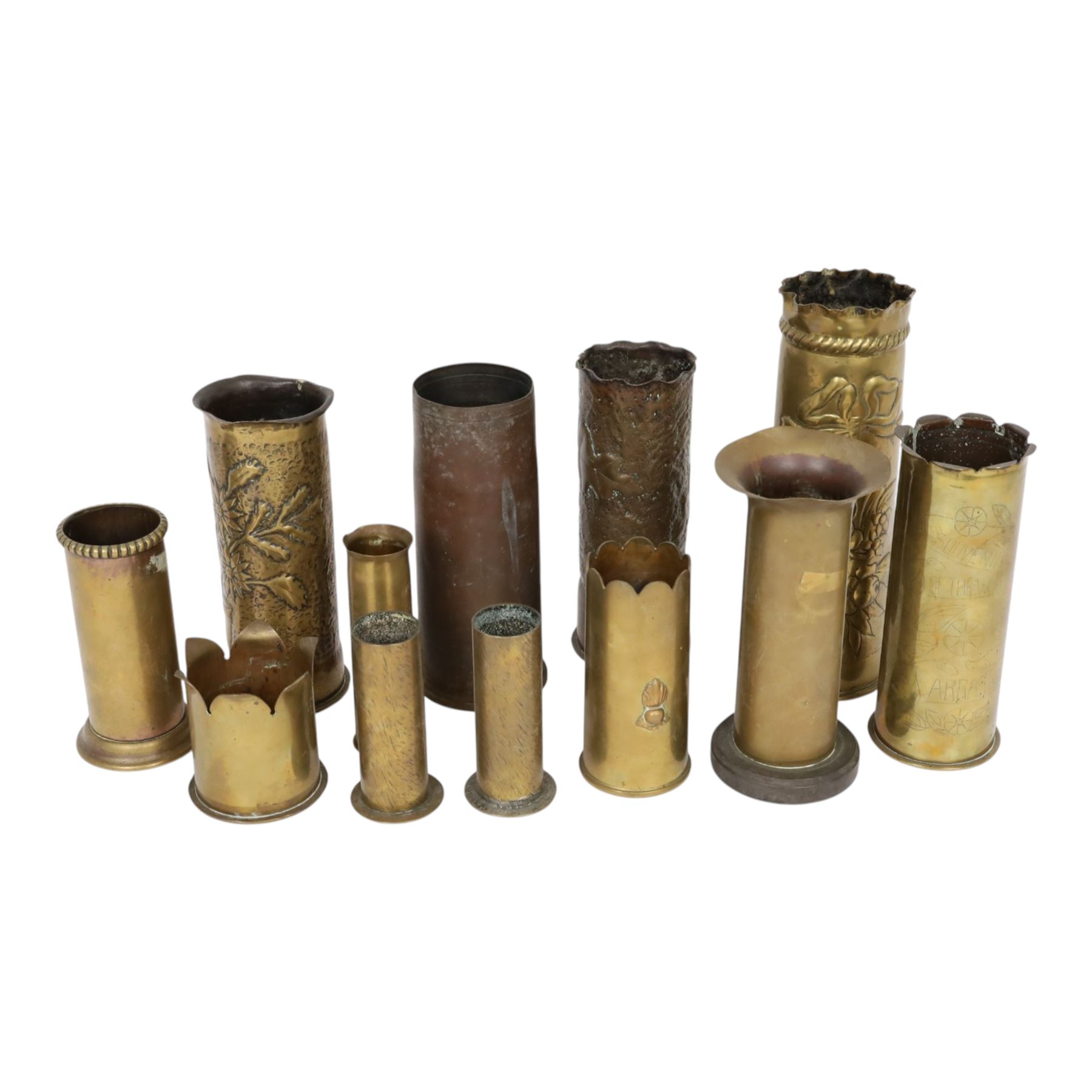 Eleven tench art shell case vases, including examples decorated in relief, with flowers, largest H30cm