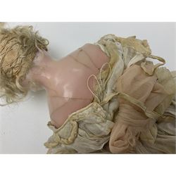 Victorian wax shoulder head doll with pale complexion, applied hair, inset glass eyes and fabric covered jointed body with kid leather lower arms; white linen dress and undergarments H50cm