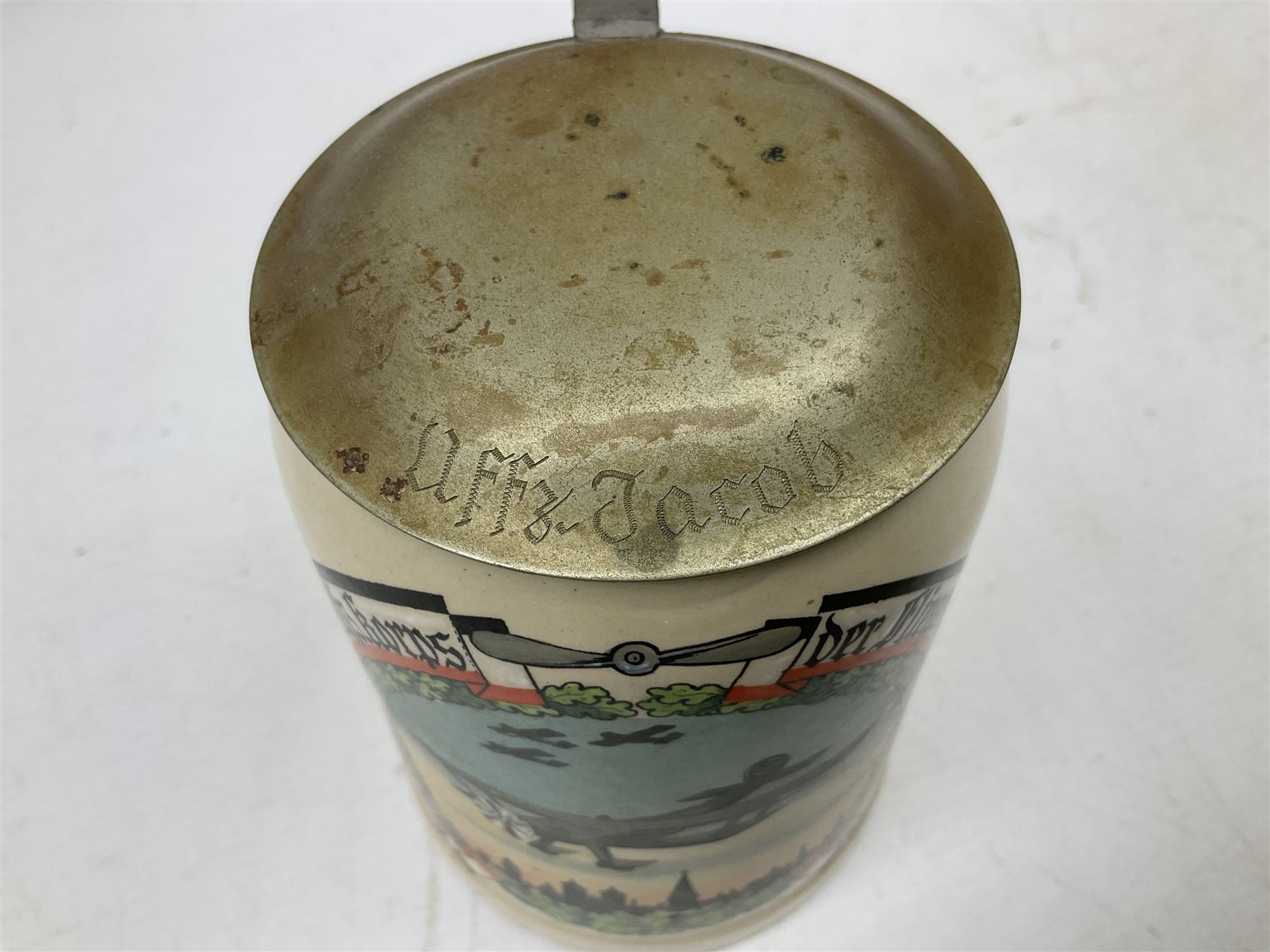 German presentation beer stein, printed with a study of a bi-plane, hinged cover engraved UFFZ Jacob, H16cm