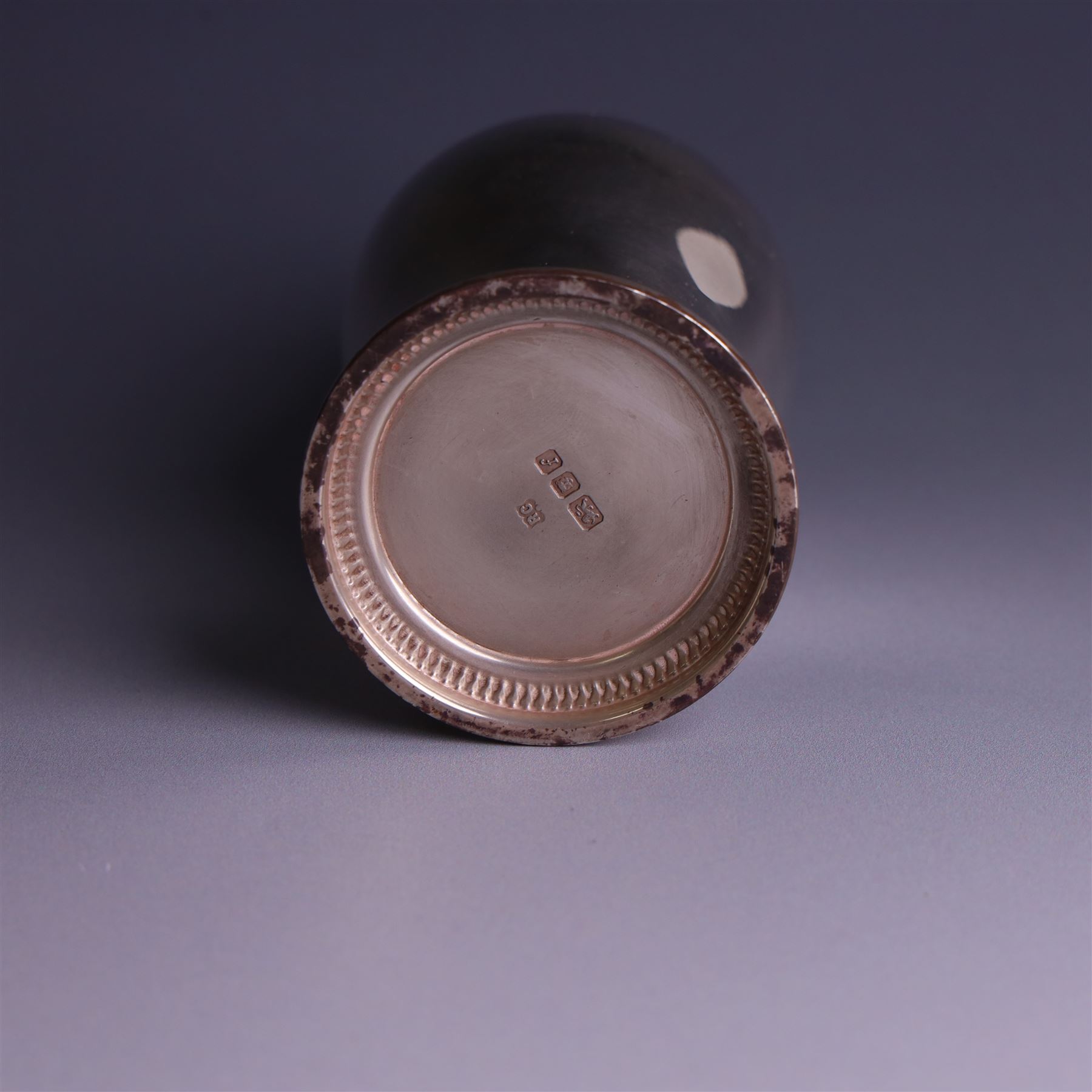 Mid 20th century silver sugar shaker, of typical baluster form, the removable pierced cover with urn finial, hallmarked William Comyns & Sons Ltd, London 1961