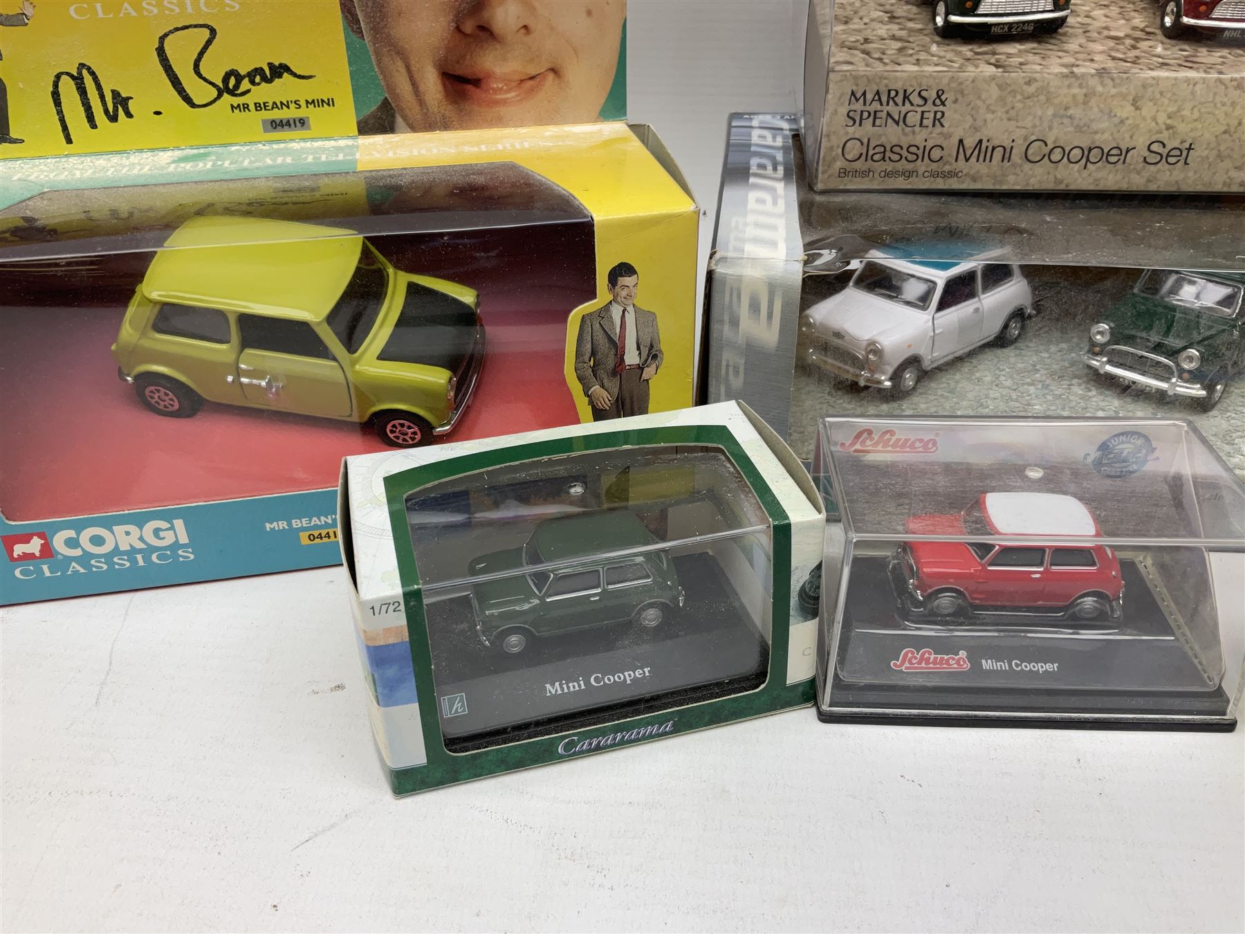 Various makers die-cast Mini cars - Cararama set of five; TechniToys SCX Vintage limited edition Mini Cooper; M&S Mini Cooper set; various Corgi including Mr. Bean; Vanguards Austin Seven mini van etc; all boxed (10)
