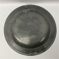 Group of seven 19th century pewter chargers, each of circular form with dished centre, two examples with touch marks verso, each approximately D39cm