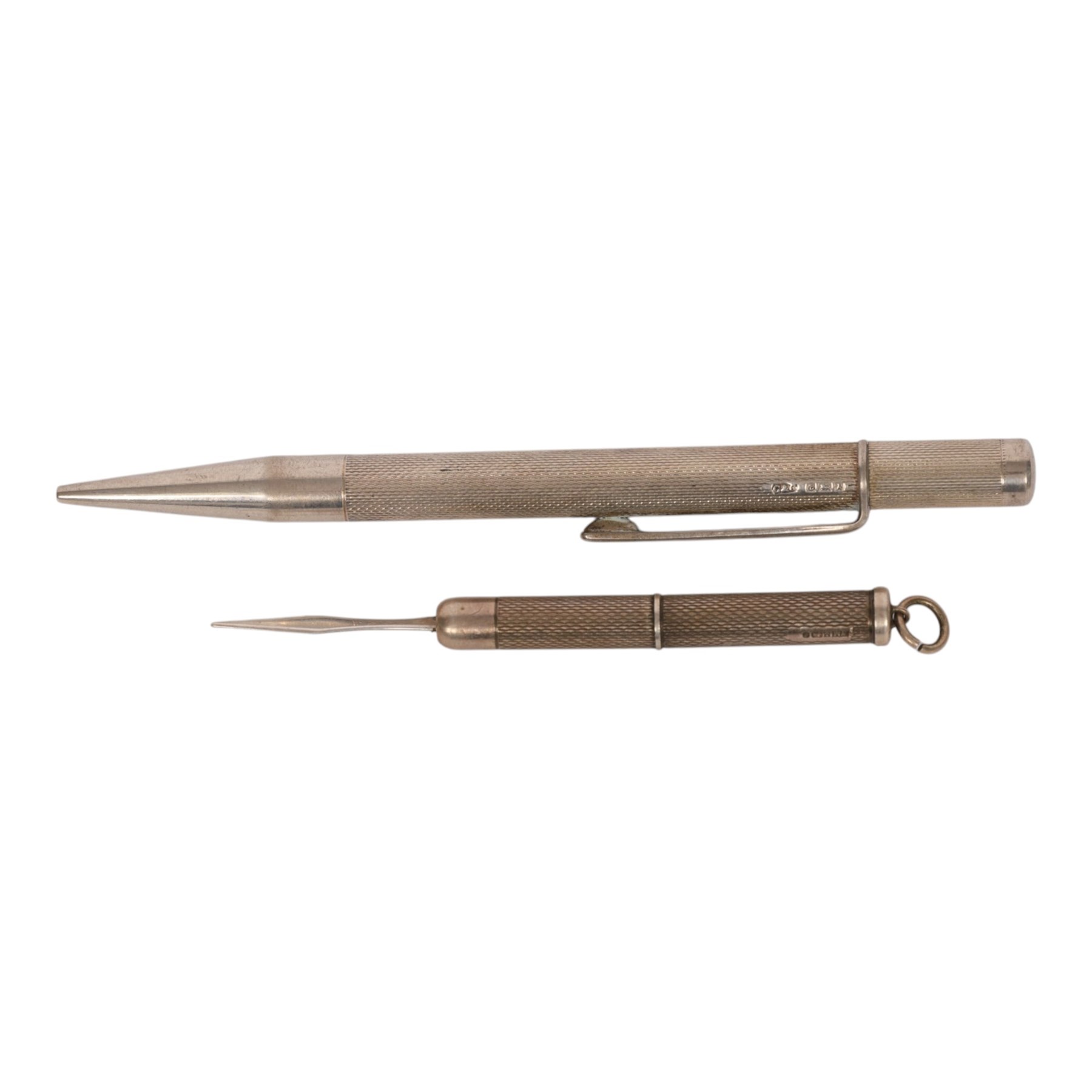 Silver propelling pencil and tooth pick, both with engine turned decoration, hallmarked