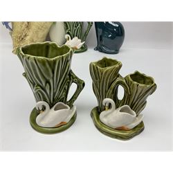 Sylvac budgieregar wall pocket, together with other Sylvac cermics including swan vases, blue tit vase and a frog figure etc, all with printed or impressed marks beneath, and a Poole Pottery cat figure, with printed mark beneath, wall pocket H22cm