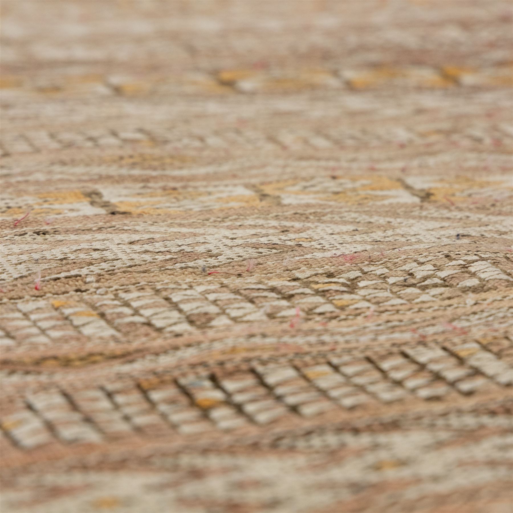 Berber style mid 20th century flat-weave kilim, woven is alternating horizontal bands of hooked lozenges, diamonds, and chevron motifs in a terracotta, ochre, ivory, and brown palette, framed by narrow geometric borders  