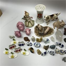 Quantity of ceramic figures of animals to include a crested ware model of a recumbent pug, Aynsley pig, Goebel pigs and other animal ceramics etc