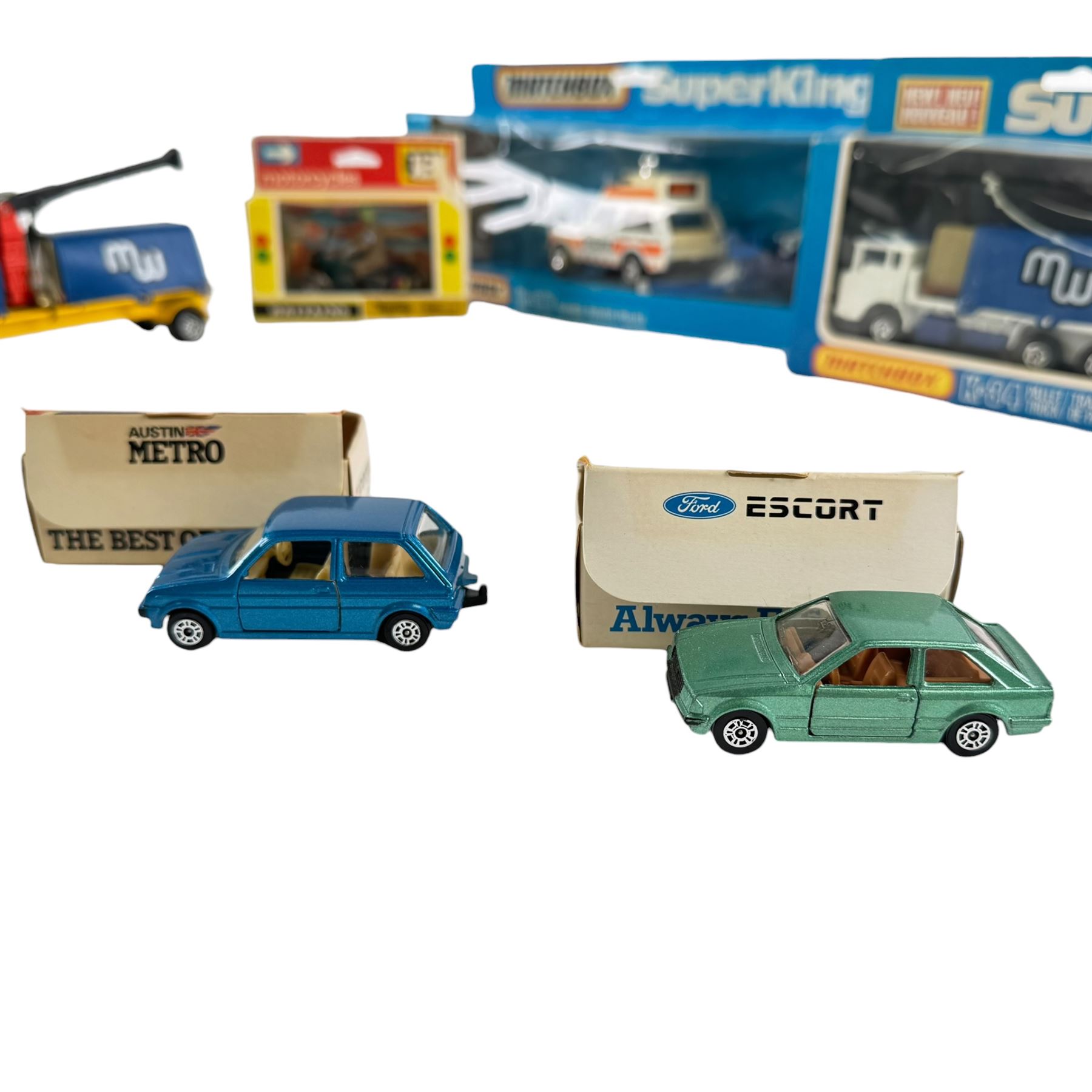 Collection of diecast model vehicles, including Matchbox Superkings K34 Pallet Truck (missing forklift), Matchbox Superkings K97 Range Rover Police, Corgi Super Silo Truck, Matchbox Superkings K17 Container Truck, Matchbox Superkings K3 Grain Transporter, Britains 9672 British Despatch Rider, Corgi Ford Escort and a Corgi Austin Metro, all boxed and Matchbox K33 Cargo, unboxed