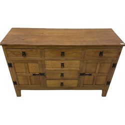 'Acornman' oak dresser, fitted with six drawers and two cupboards, carved Acorn signature