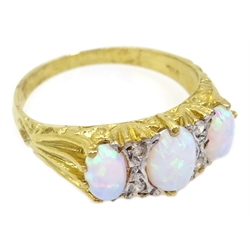  Silver-gilt three stone opal ring, stamped SIL  