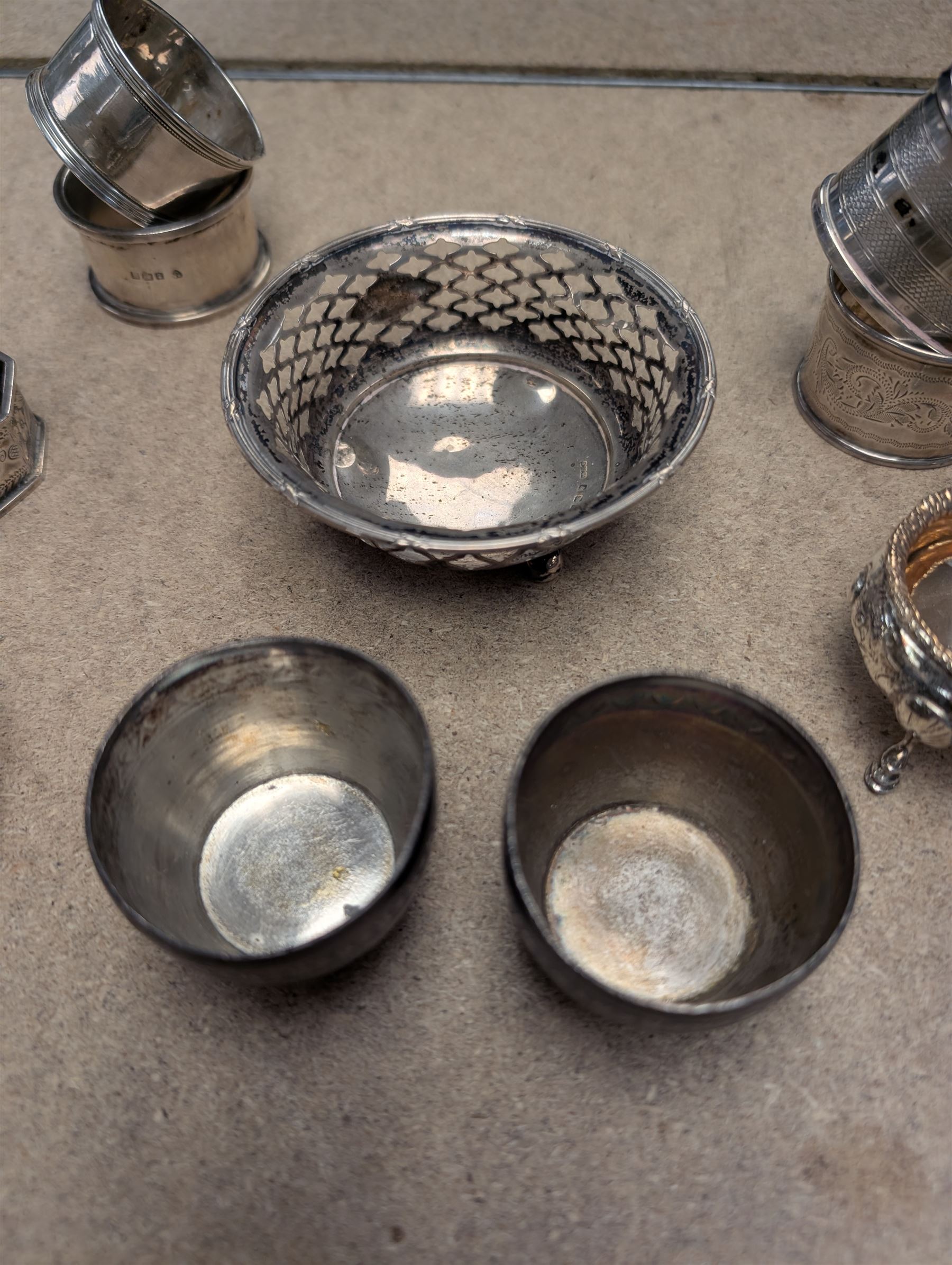 Group of silver, comprising napkin rings, open salts, egg cups, etc all hallmarked 
