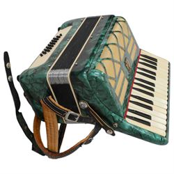 Parrot - Chinese two octave 30 treble key piano accordion with 24 bass buttons,14 fold bellows in a hard velvet lined case.