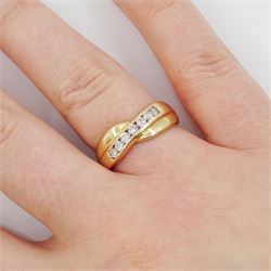 Gold channel set, round brilliant cut diamond crossover ring, total diamond weight approx 0.30 carat