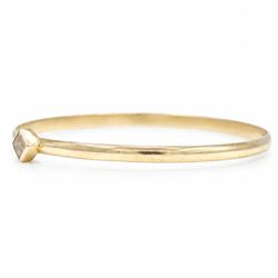 18ct gold fancy champagne / brown diamond bangle, bezel set with a single princess cut diamond of approx 0.70 carat, stamped 750