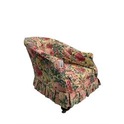 Victorian low tub shaped armchair, beech framed with compressed bun feet, loose floral fabric