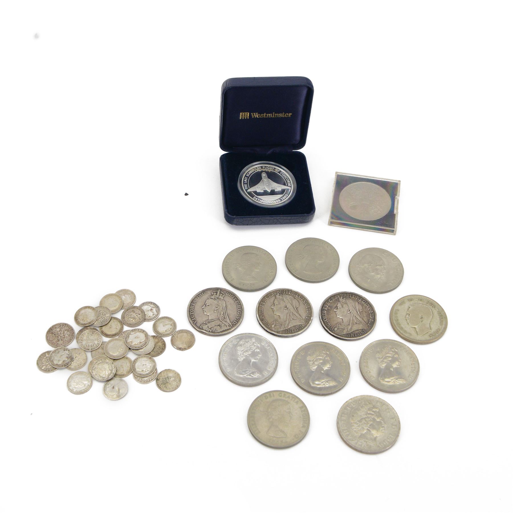 Three Queen Victoria silver crown coins dated 1892 and two 1893, various silver threepence pieces, King George VI 1937 crown, commemorative crowns and Queen Elizabeth II East Caribbean States 2003 'The Last Scheduled Flight Of Concorde' silver proof ten dollars coin cased with certificate