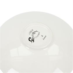 Three Poole pottery chargers, in Wild Poppy pattern, Delphis pattern and Aegean pattern, together with a Poole pottery dish and plate  