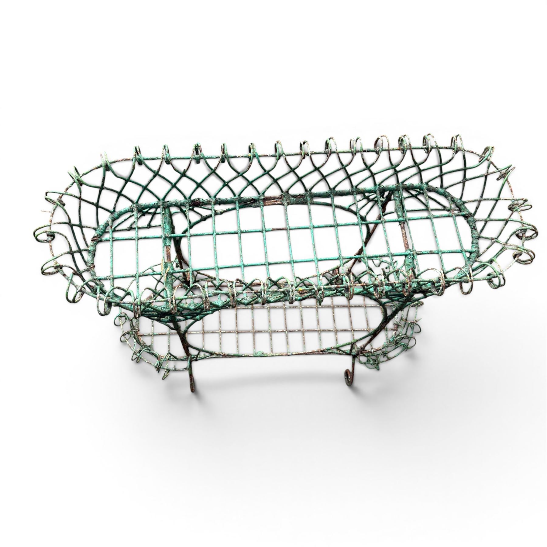 Victorian country house ornate wirework basket conservatory or garden planter, two tier form with oval centre