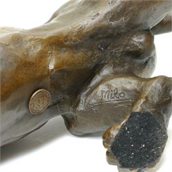 Bronze figure, modelled as a cougar in crouching pose, after Milo and with foundry mark, L42cm 