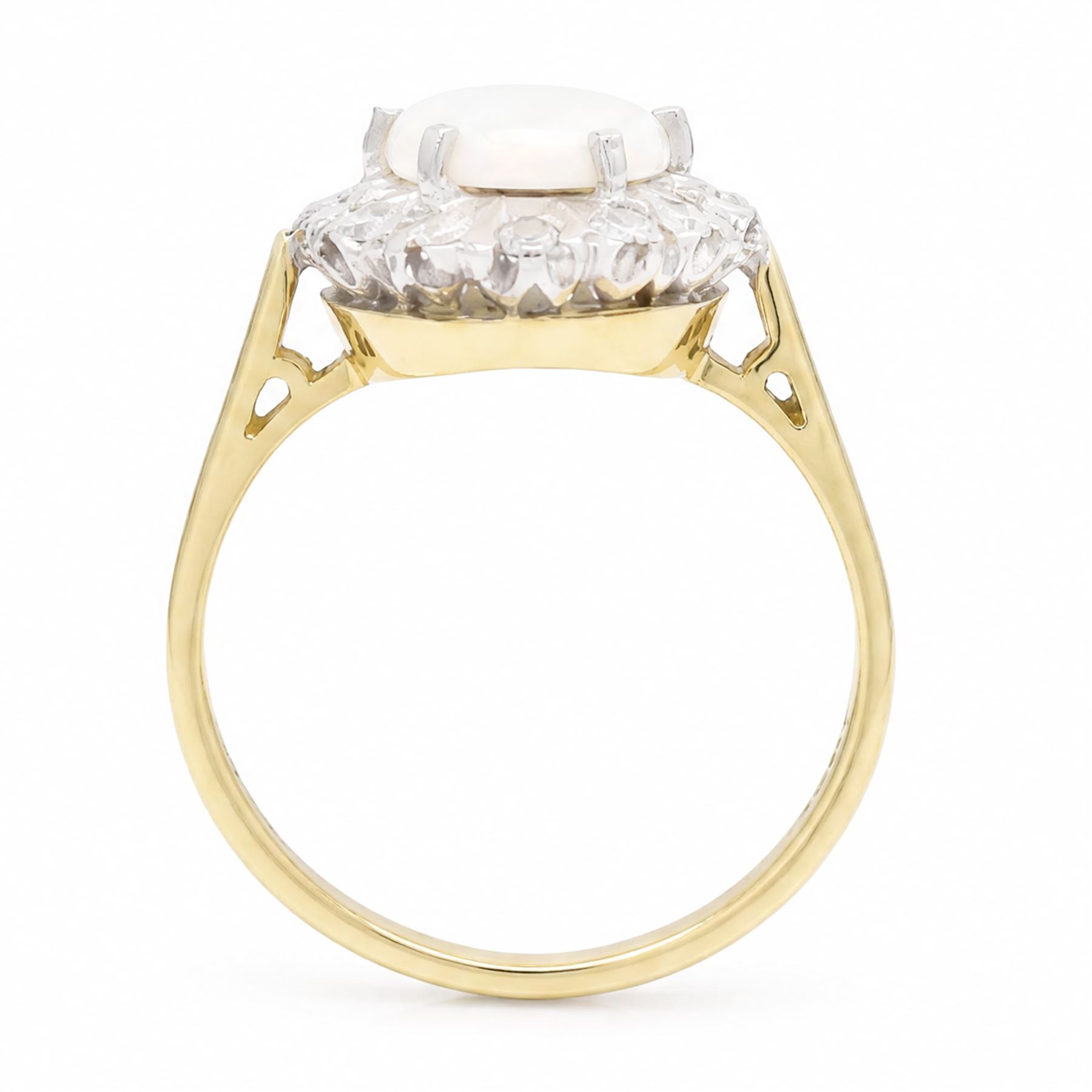 18ct gold opal and diamond cluster ring, oval cabochon cut opal surrounded by twelve single cut diamonds, London 1988