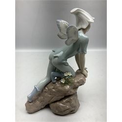 Lladro Privilege figure, Prince of Elves, modelled as an elf with wings leaning upon a rock, with original box, no 7690, sculpted by Joan Coderch, year issue 2001, year retired 2003, H23cm