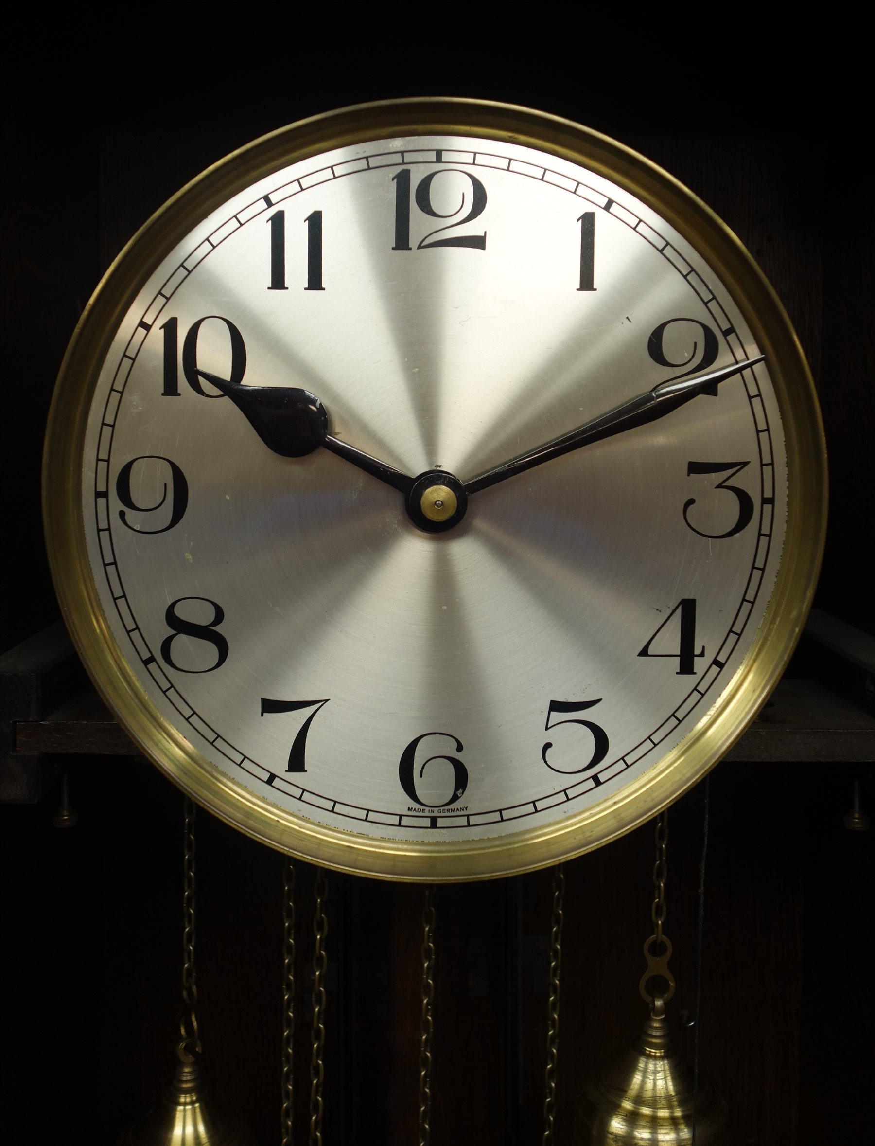 Early 20th century oak longcase clock, silvered Arabic dial, triple