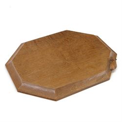 Mouseman - adzed oak breadboard or chopping board, canted rectangular form carved with mouse signature, by the workshop of Robert Thompson, Kilburn 