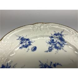 Early 19th century Nantgarw 'Lady Seaton' porcelain plate, circa 1820, hand painted with cobalt blue enamel floral sprays, with shaped and scroll moulded rim within a gilt line, with impressed marks beneath, D25cm