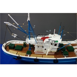  Part wooden scale kit model of the Norwegian Fishing Boat Carmen, twin-masted with single screw, on stand, L39cm H62cm  