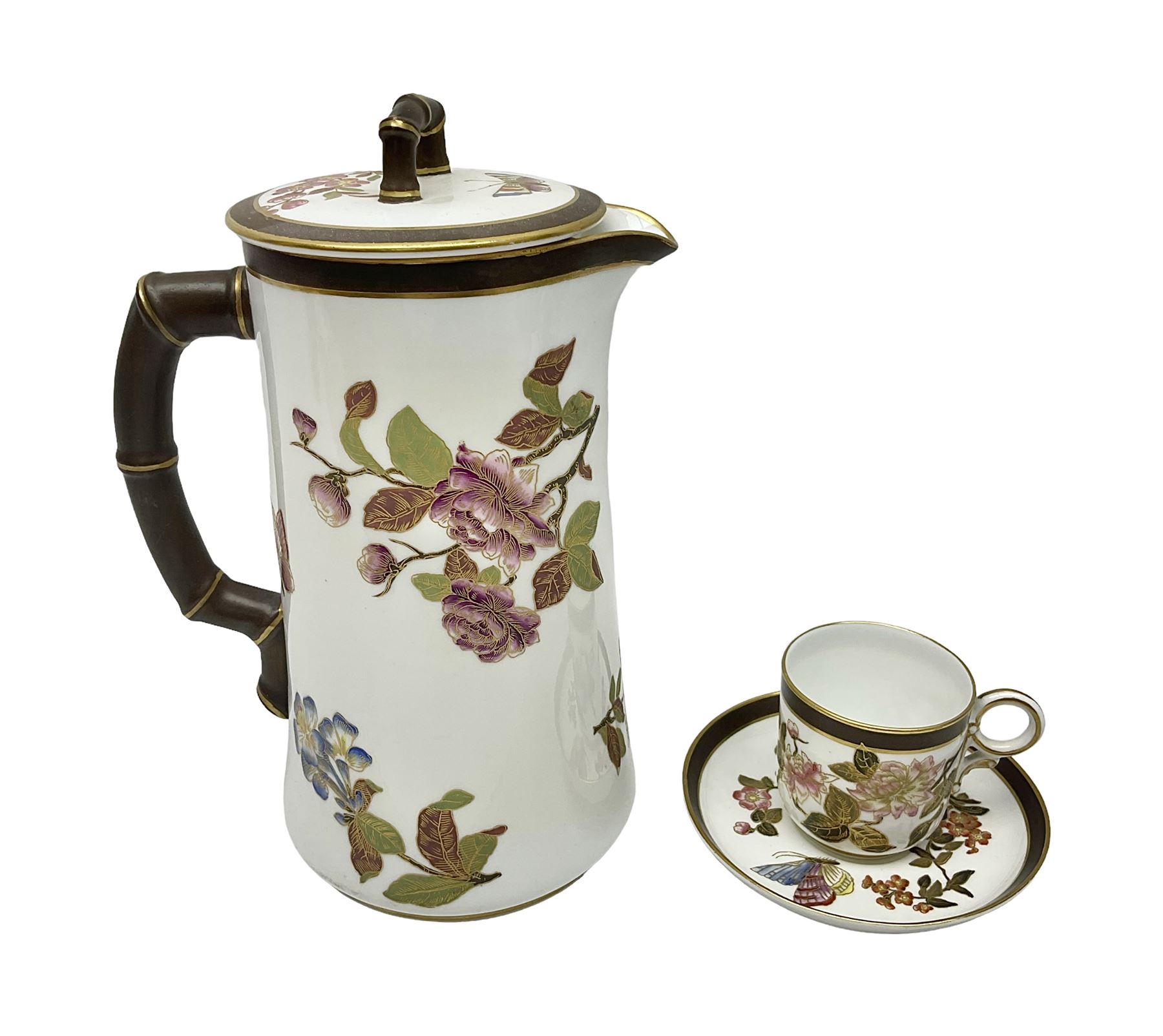 Royal Worcester coffee pot, coffee cup and saucer, all decorated with floral sprigs and butterflies, the coffee pot with a bamboo handle, H23cm