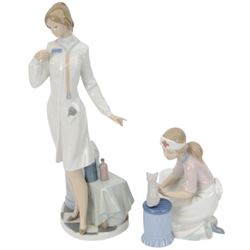 Four Lladro figures, comprising Loving Care no 6087, Young Nurse no 6307, Girl with Chicken no 4592 and Female Physician no 5197, three with original boxes 
