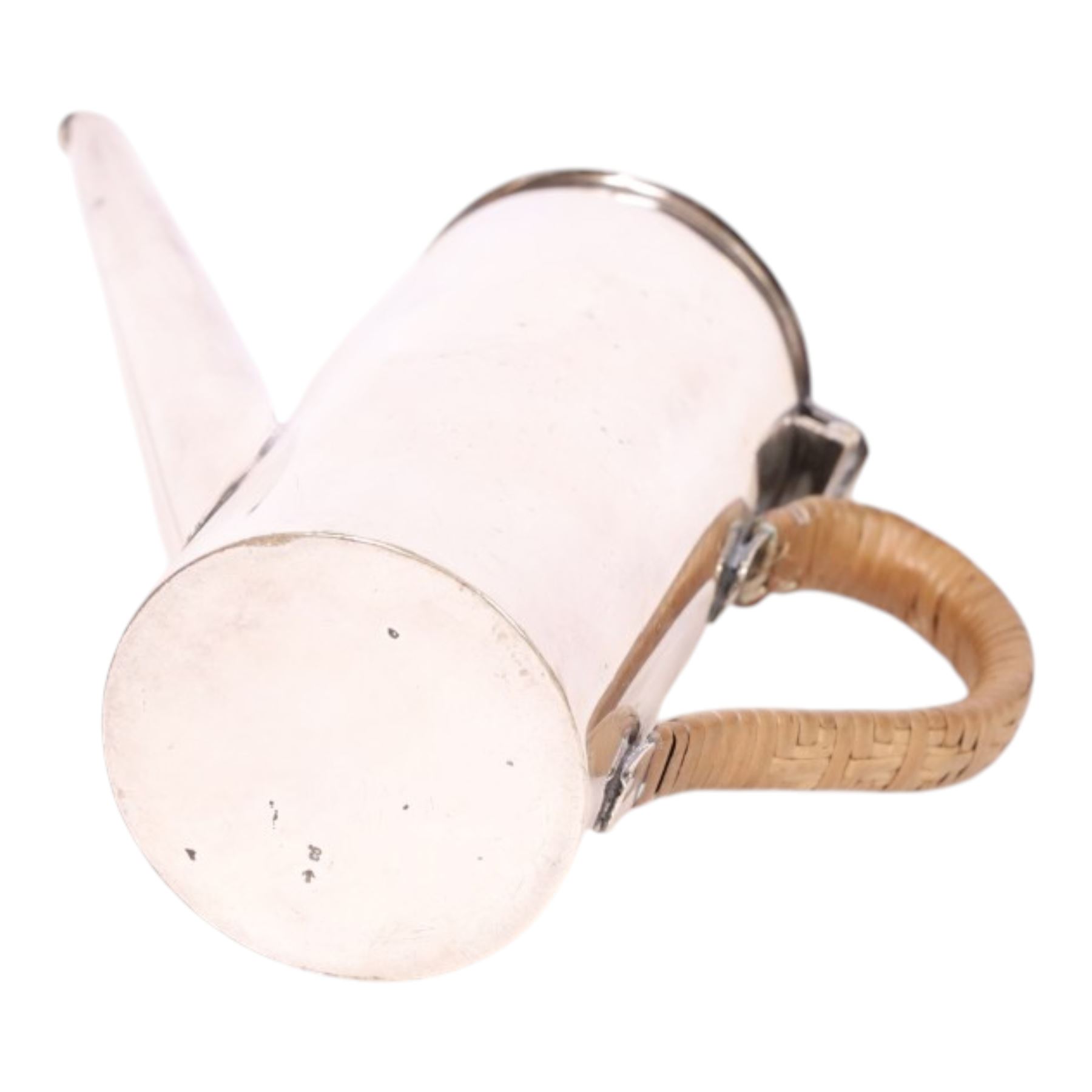 Manner of Christopher Dresser (1834-1904) - James Dixon and Sons teapot together with Hukin & Heath Christopher Dresser design coffee pot, of tapering cylindrical form with a strapwork handle, teapot H13cm 