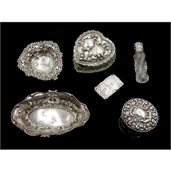 Edwardian silver mounted glass heart dish by Jones & Crompton,silver mounted glass jar by James Deakin & Sons, silver mounted scent bottle, silver heart dish by George Unite and one other, all hallmarked, 19th century continental miniature table stamped, George II silver ladle, London 1756 and one other set with a silver George II coin (8)