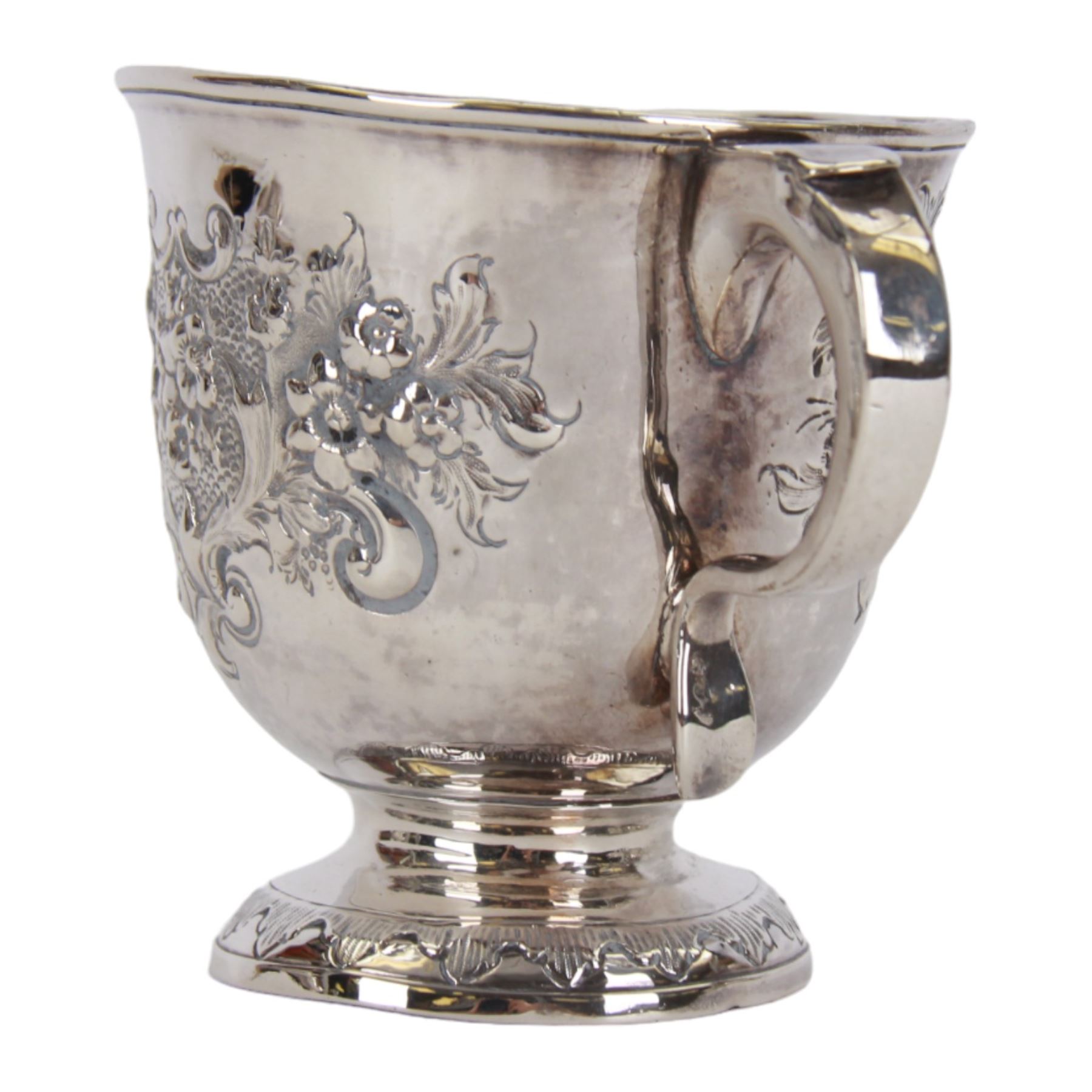 George I silver porringer, of typical form with flat capped twin curved handles,  the body with later presentation engraving surrounded by later embossed foliate decoration, upon a spreading circular foot, hallmarked Sarah Holaday, London 1723, H10.5cm