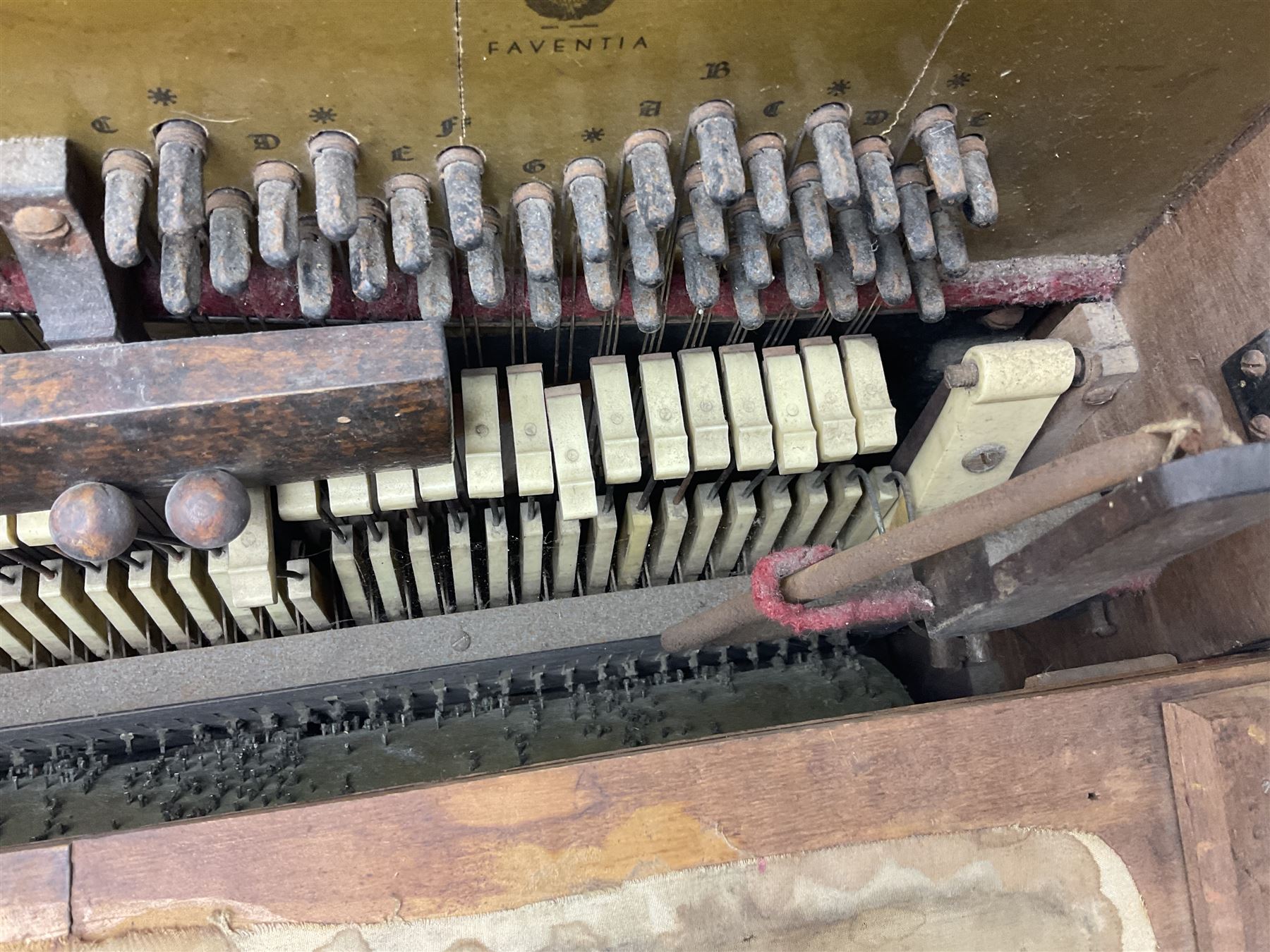 Faventia Half size miniature Spanish barrel piano with a 40cm cylinder playing tunes on a 37 note movement including woodblock and triangle, in a painted case with silk embroidered decoration to the front.  Vicente Linares, Barcelona trade label, with original crank handles, stringing, hammers action, tuning pins and cylinder