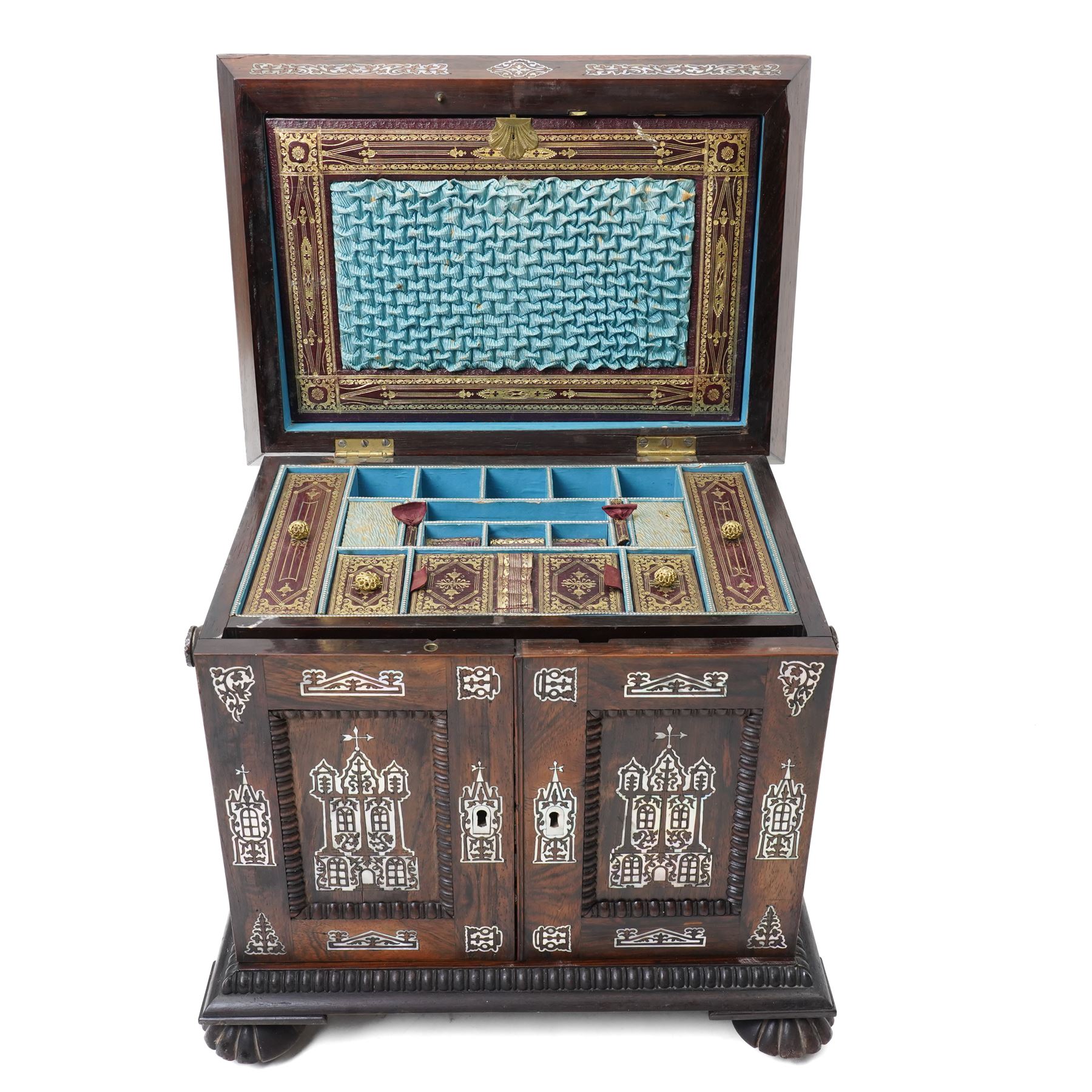 Early Victorian rosewood and mother of pearl inlaid sewing, jewellery, and writing casket  with hinged lid, the upper section fitted for sewing implements, above four drawers, the bottom drawer with writing slope and on compressed fluted feet H36cm x W34cm