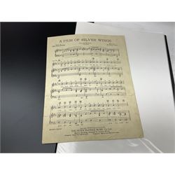 Two albums of Victorian and later sheet music, many with attractive illustrated coloured covers, to include some war and air force related examples to include The Frost Polka, Milk to my Tea, Tour Songs of the Air Service, Silver Wings in the Moonlight, etc, some facsimile