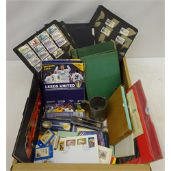  Collection of British and World stamps and miscellanea including Queen Elizabeth II used high values, unused postage, World stamps in albums and stock books, FDCs, Leeds United football programmes, teaspoon marked '800' and other miscellanea in one box  