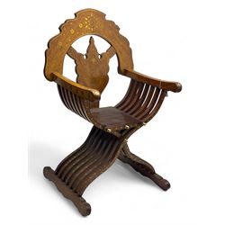 Late 20th century brass inlaid hardwood throne chair, curved X-frame form, raised shaped back inlaid with trailing leafy branches and flower heads, on sledge feet 