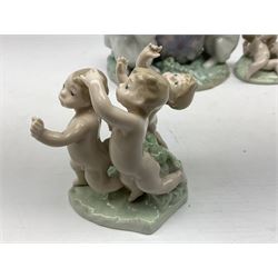 Three Lladro figures, comprising Easter Bunny no 5902,  Tumbling no 5805 and Playing Tag no 5806, two with original boxes, tallest example H16cm