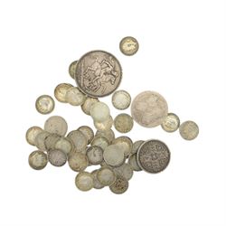 Queen Victoria 1891 silver crown coin, Queen Victoria 1849 'Godless' florin, Queen Victoria 'Gothic' florin (date rubbed), approximately 43 pre-1920 silver threepences, approximately 112 grams of pre-1947 silver coins, Roman Germanicus coin, and further Great British and World coins and banknotes, hosed in a green Ringtons tin