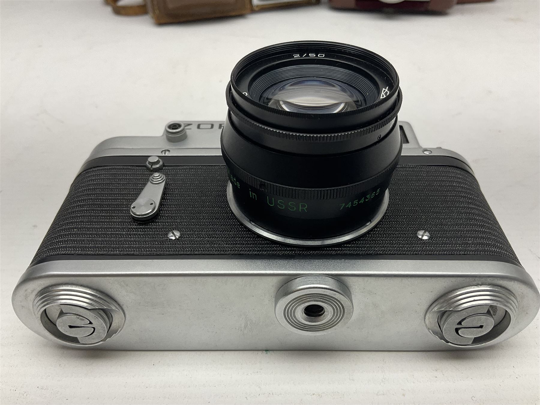 Zorki-4K camera body, serial no 74334713 with 'Jupiter-8 2/50' lens serial no 7454365, Zorki-4 camera body serial no 71012418 with 'Jupiter-8 2/50' lens serial no 0174594, and three other cameras 