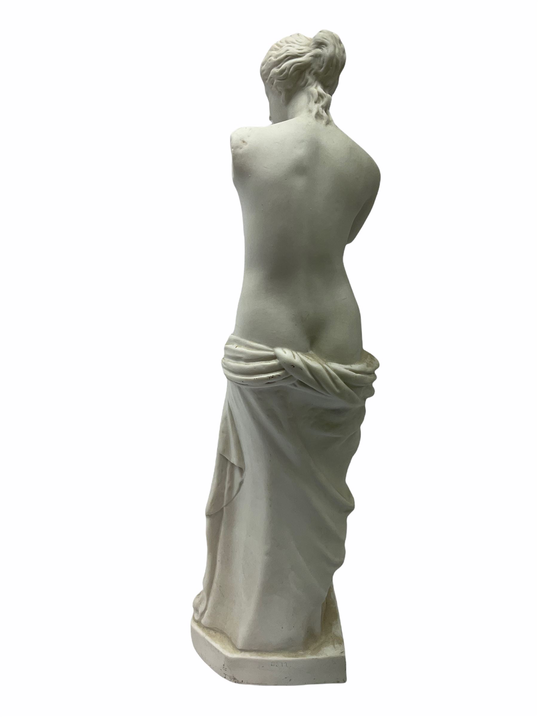 Victorian Parian ware twin handled vase detailed with Bacus masks fruiting vines and floral sprays H36cm, together with a Parian jug H14.5cm, classical Parian sculpture H40cm, decorative plaque decorated in high relief depicting two children D18.5cm. 