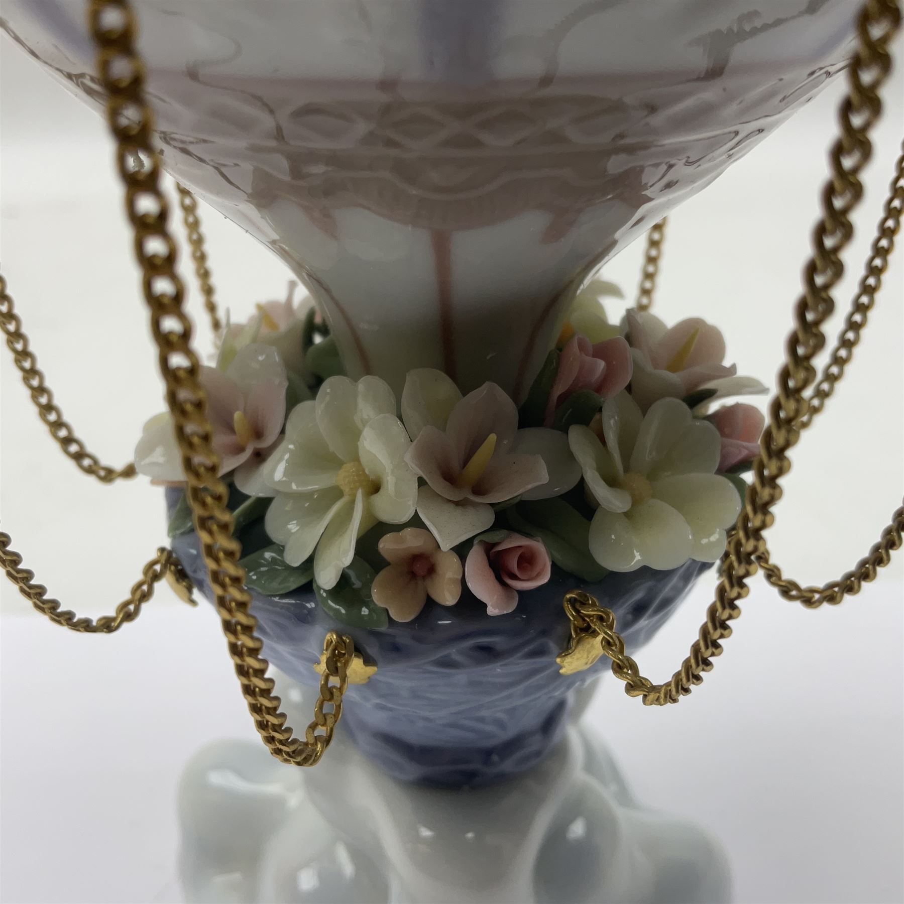 Lladro Flying High, modelled as a hot air balloon, with brass chains to suspended blossom filled basket, no 6523, with original box, H23cm