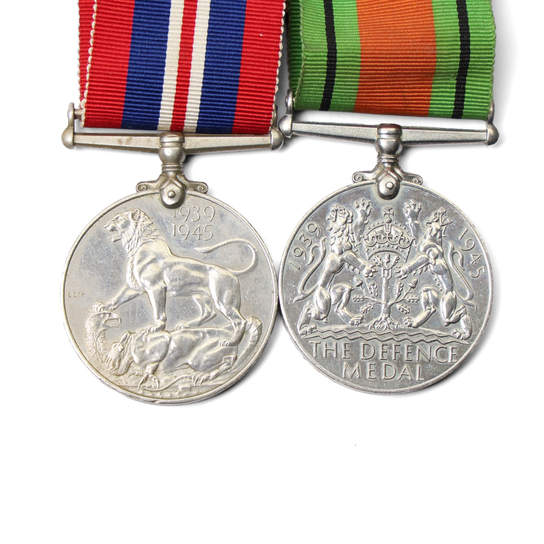 Group of five WWII medals comprising War Medal, 1939-1945 Star, Africa Star with 8th Army clasp, Italy Star and France and Germany Star, another group of War and Defence Medals, 1939-1945 Star and Africa Star, and a copy of the New Testament from George VI inscribed Leonard John Green, 3525653, RAOC, REME 1942, Att Black Watch 1944 and 1945 and Lee Enfield rifle number K91476