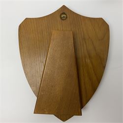 Parachute regiment - chrome crest on oak easel shield; three cloth badges; small silver plated figure; and pin badge; together with 10cm diameter cannon ball etc