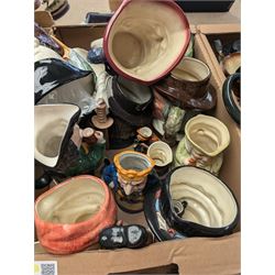 Collection of character and toby jugs and teapots, mostly Royal Doulton examples, in three boxes 