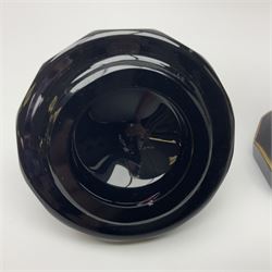 19th Century Bohemian amethyst glass lidded goblet, the bowl of faceted form, gilded with three children in period dress playing games, upon a knopped stem and conforming faceted foot, together with an art nouveau green glass goblet, with gilded rim, upon clear trumpet stem, and a hand blown wine glass, transfer printed with birds and three figures in period dress, tallest H29cm